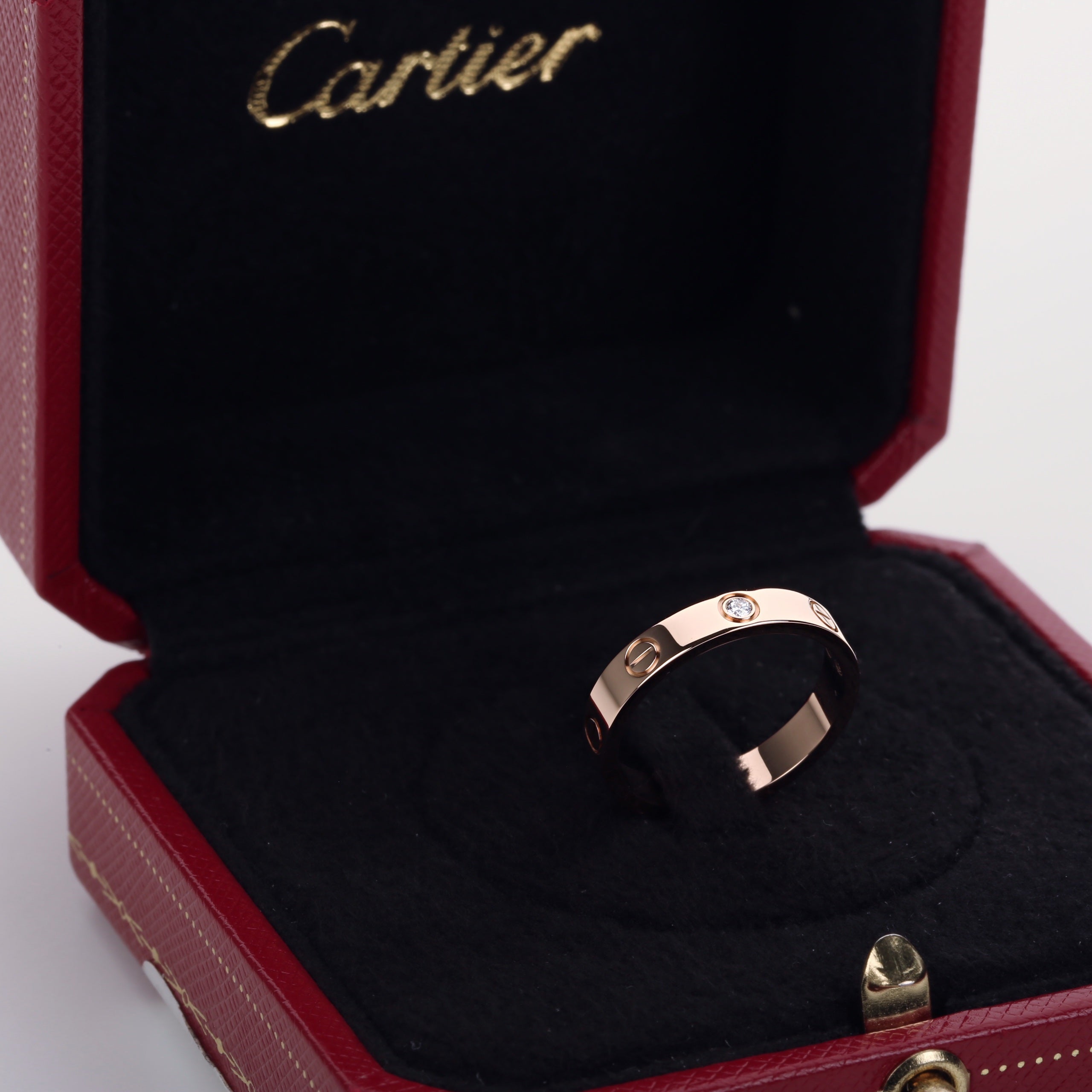 cartier love wedding band pink gold price
