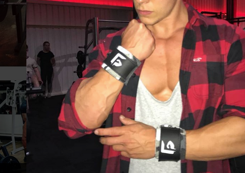 Athlete wearing the arctic camo Gunsmith Fitness wrist wraps