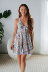 V-neck High-Low-Hem Short Smocked Babydoll Ruffle Trim Self Tie Open-Back Tiered Floral Print Dress With a Ribbon