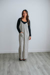 V-neck Pocketed Spaghetti Strap Striped Print Jumpsuit