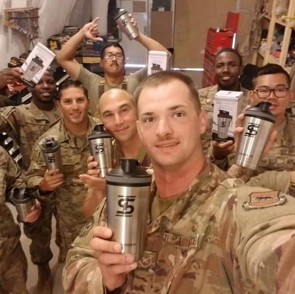 Military personnel with donated Ice Shakers