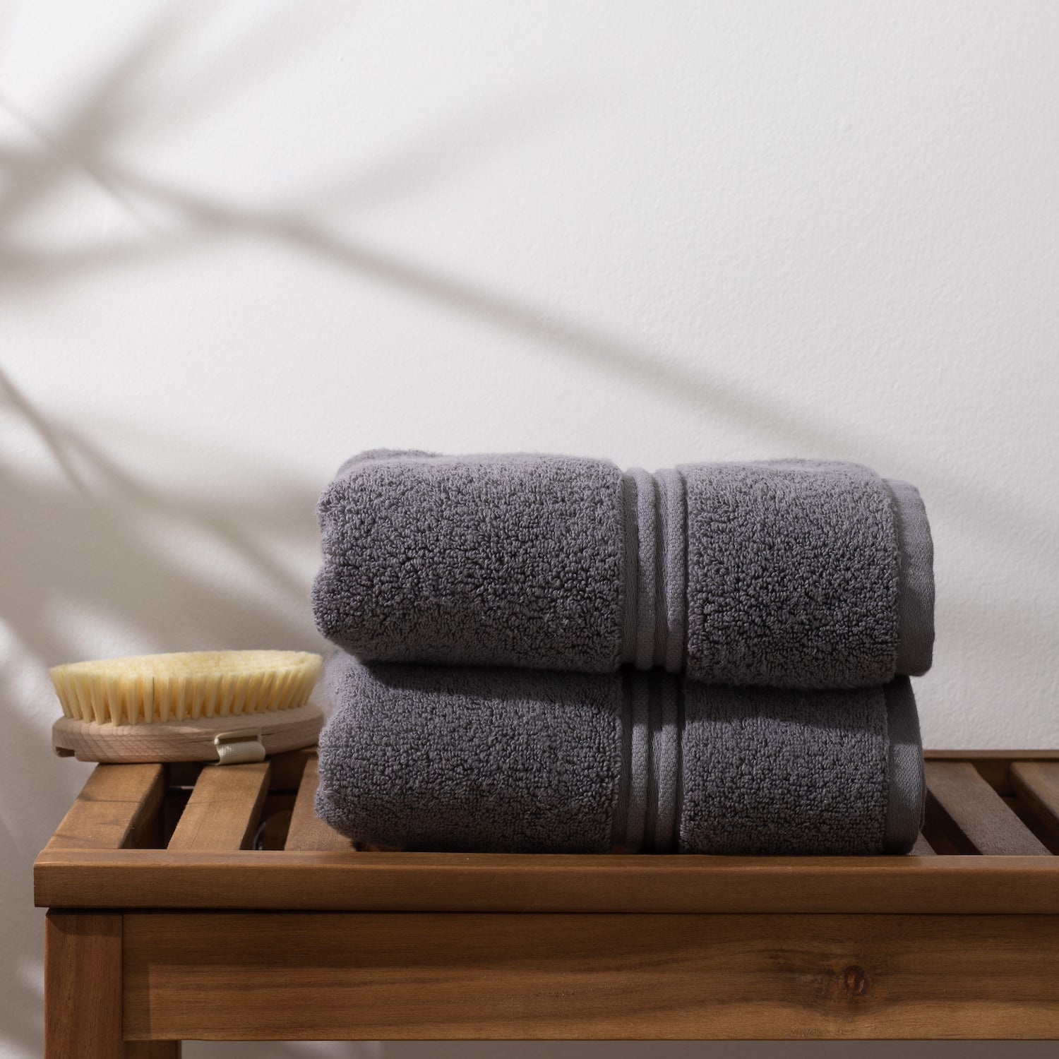 https://cdn.shopify.com/s/files/1/1492/2050/products/grey_hand_towel.jpg?v=1591136454&width=1500