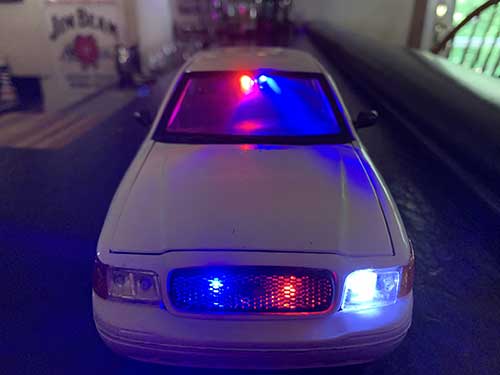 Flashing lights in police car