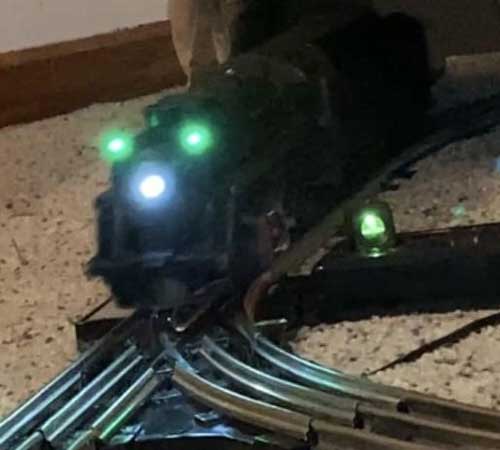 Train Engine with green and blue light in front