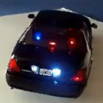 diecast police cars with working lights and sirens
