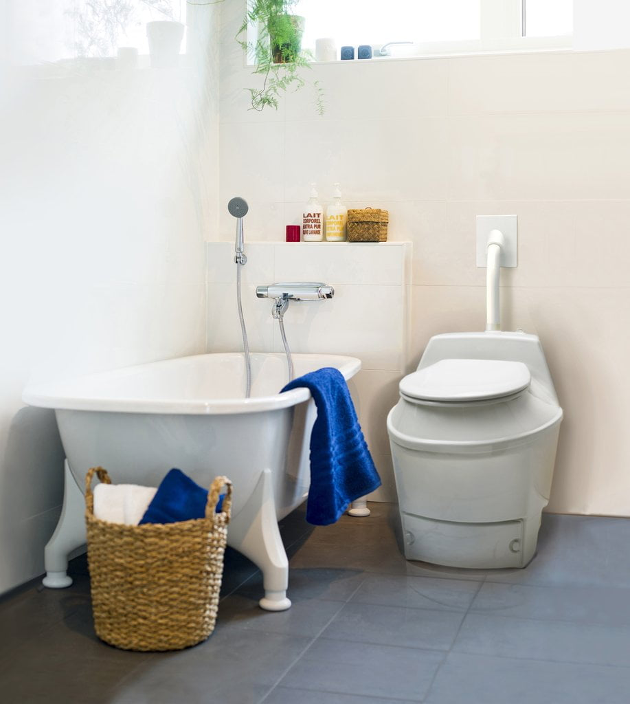 BioLet 55 Composting Toilet in a modern bathroom setting, featuring water-saving design, eco-friendly waste management, and space-efficient features for sustainable living.