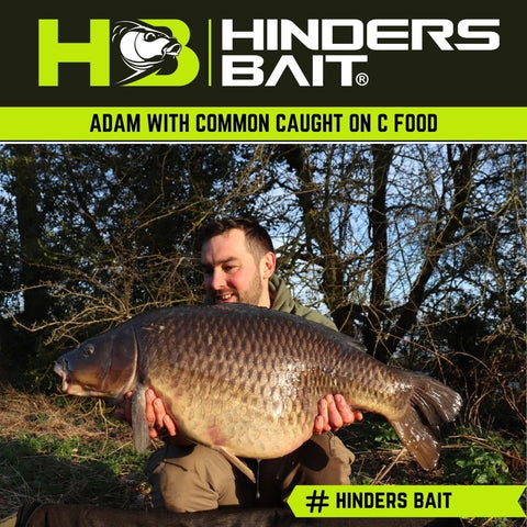 Adam with a Common Carp caught using C Food Boilies