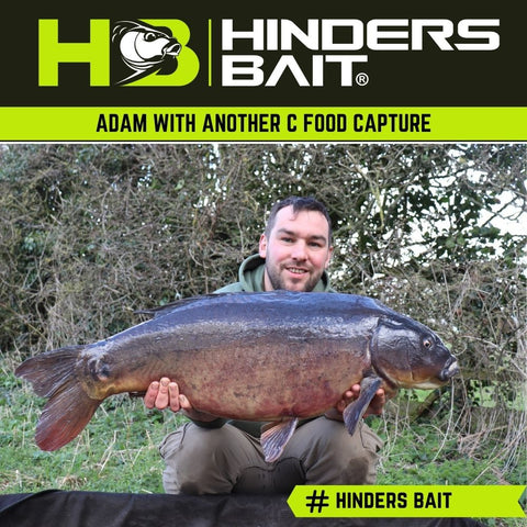 Adam with a Carp caught using C Food