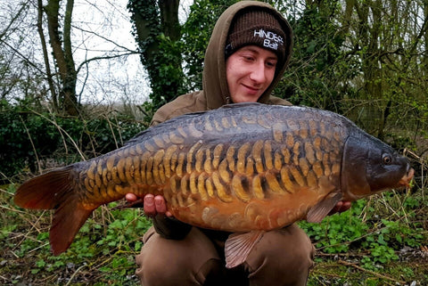Callum with a stunning carp