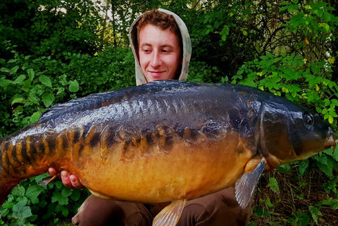 Callum with a Mirror Carp