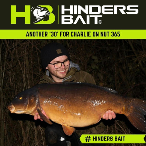 Charlie with a Carp caught on Nut 365