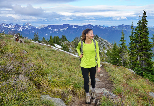 Model on mountain wearing Woolx