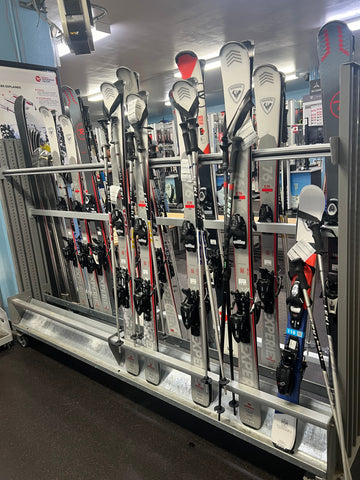 Skiis lined up in rental area