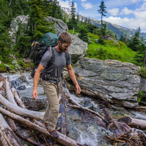 Man wearing Endurance tee on a mountain