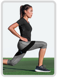 Woman lunging with a resistance band around thighs