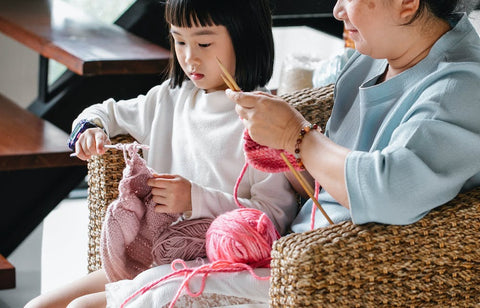 mom and girl knitting