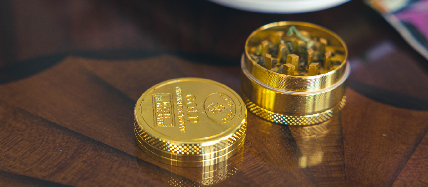 Gold metal weed grinder