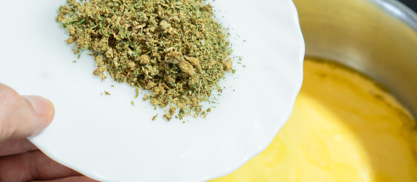 Ground cannabis into butter