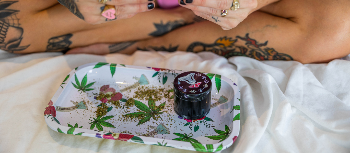 Mushroom metal weed grinder on rolling tray