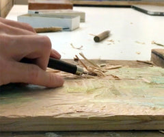 Carving a woodcut