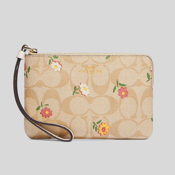 COACH Corner Zip Wristlet In Floral Print Coated Canvas in Blue