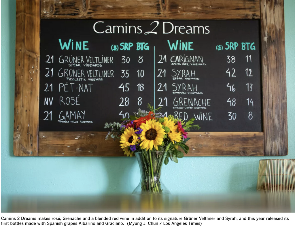 chalkboard listing of wines to order