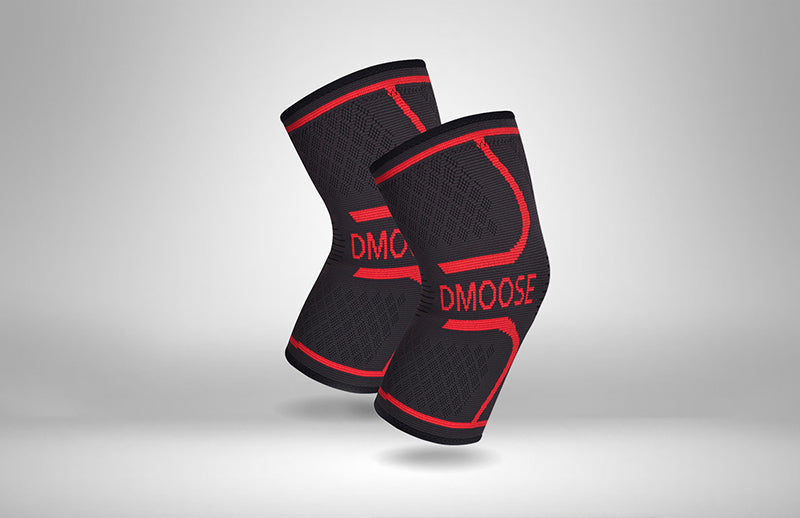 A pair of Dmoose knee sleeve in Black & Red