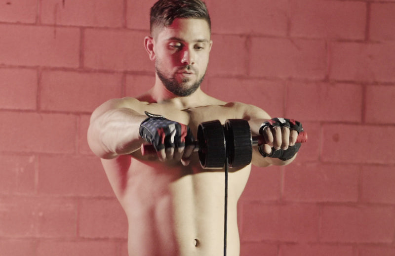 A young man is doing forearm wrist exercise with DMoose wrist Strengthener