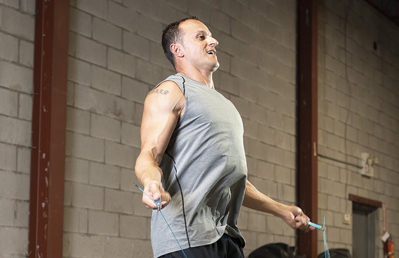 A man using DMoose workout jump rope for skipping