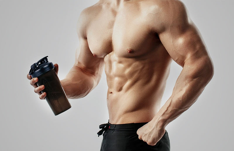 A bodybuilder showing Dmoose shaker bottle by holding in his hands