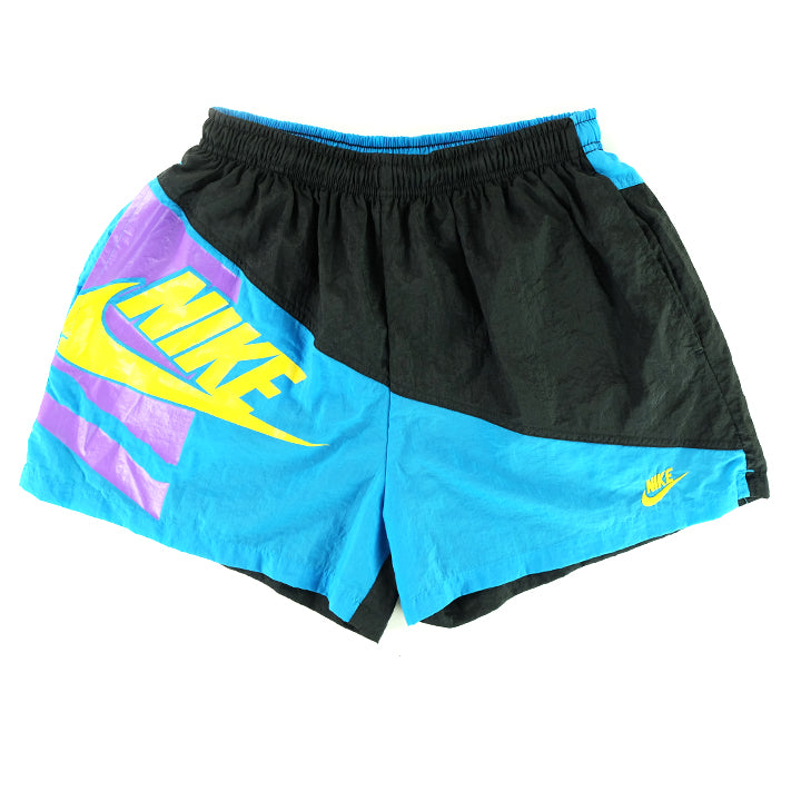 Vintage Nike 'RARE' Grey Tag Logo Shorts - M – Steep Store
