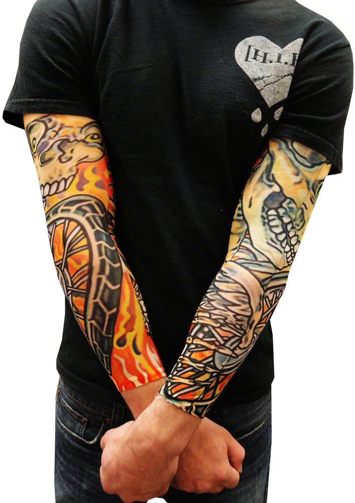 blue flames forming skulls in this sleeve work tattoo for Steve Work  in progress  Blue flame tattoo Flame tattoos Tattoos