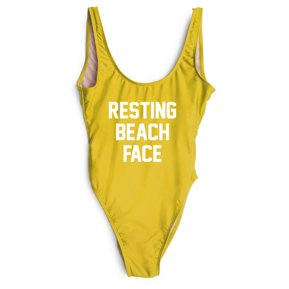 resting beach face swimsuit