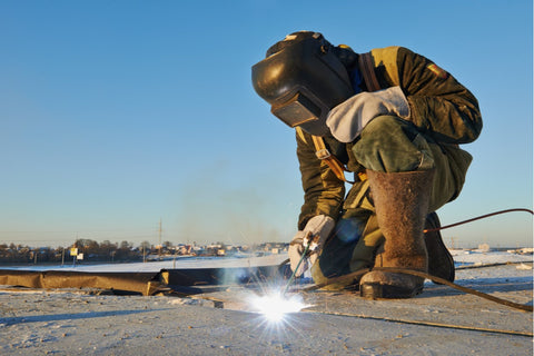 welder construction worker winter cold weather keeping warm