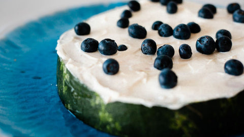 healthy watermelon cake for your dog with blueberries and Greek yogurt