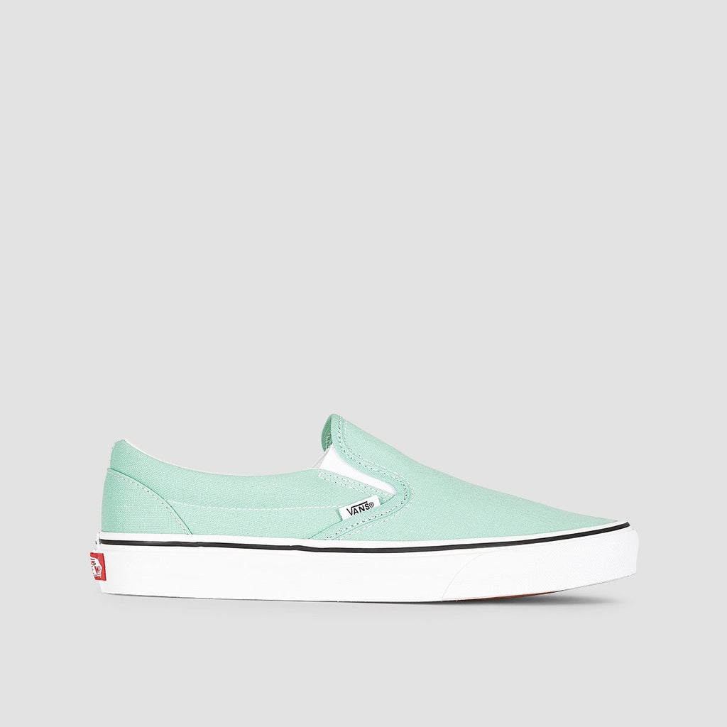 green and white slip on vans