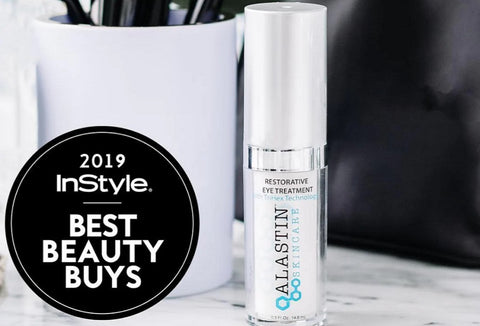 InStyle Best Beauty Buys 2019 Circle next to ALASTIN Skincare product and mug of makeup brushes