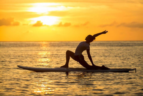 yoga stand up paddleboarding