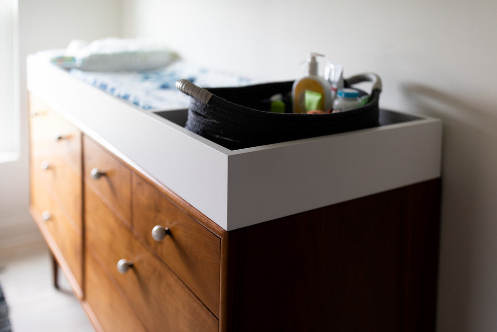 brown changing table dresser