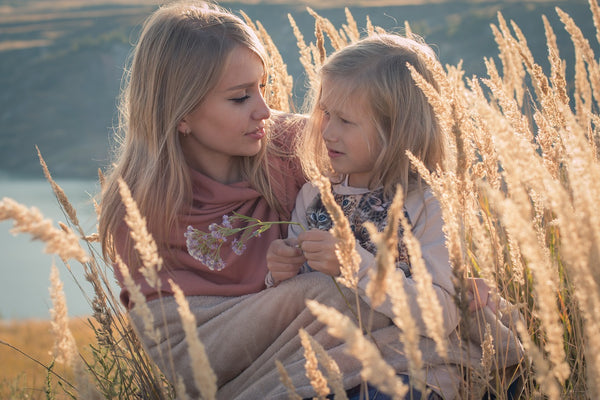 Mom comforting her daughter