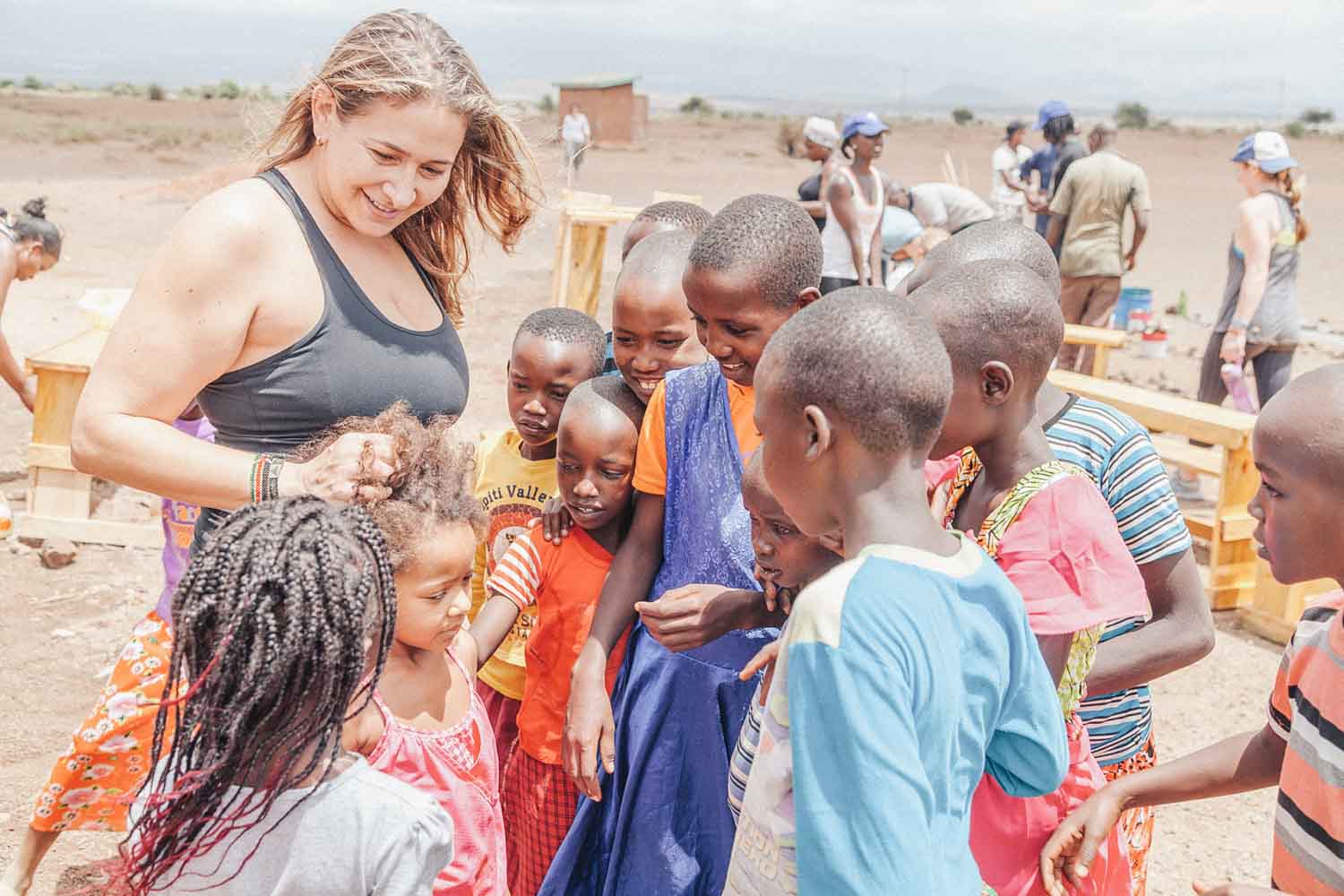 Group of African children with Paige Elenson