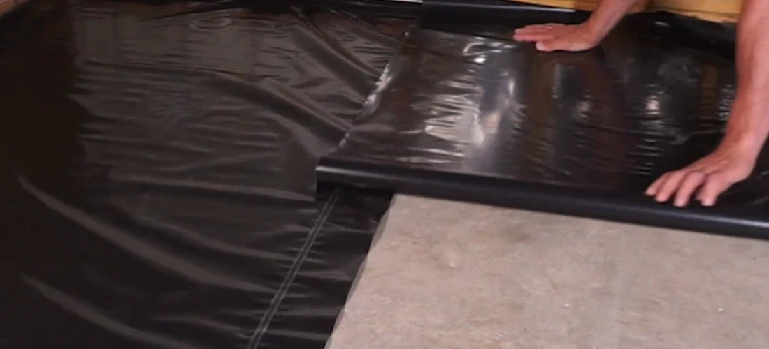 laying of waterproof poly film underlayment