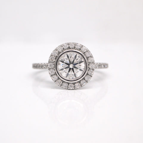 custom bezel set diamond halo engagement ring