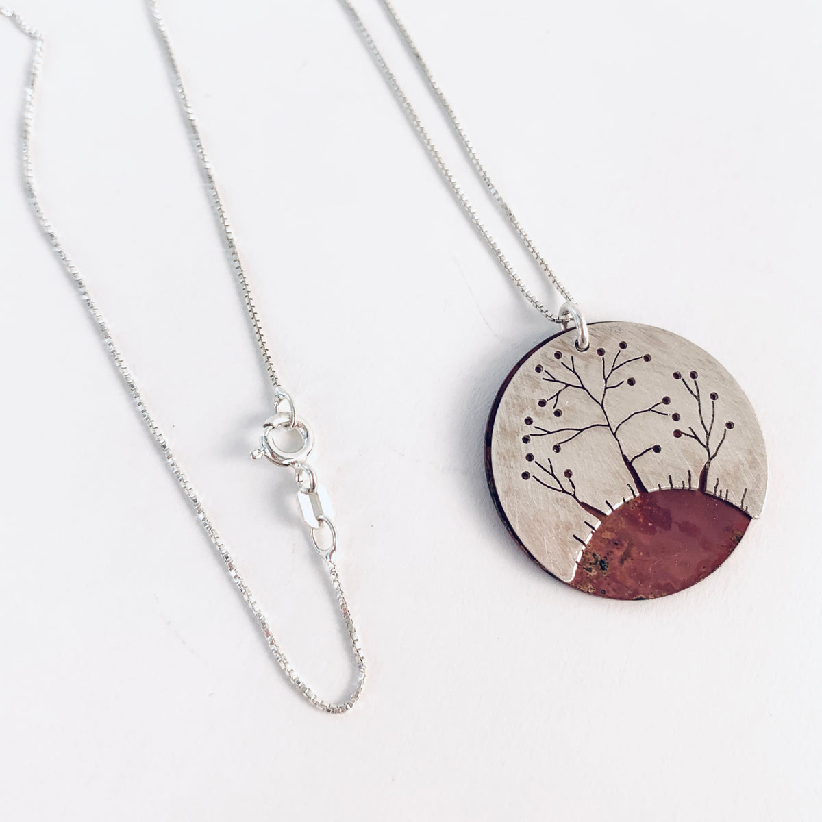 SILVER TREES ON COPPER NECKLACE – Scanlon Gallery & Custom Framing