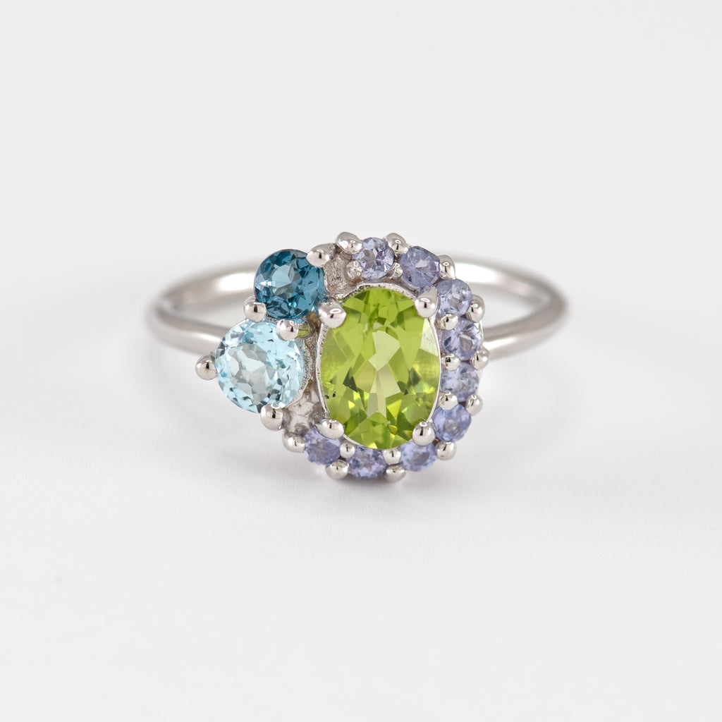 Peridot, Tanzanite, and Topaz Cluster white gold ring Kennedy at Minette