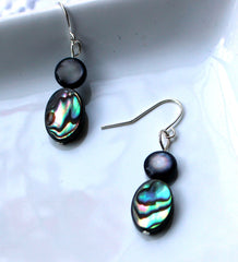 small earrings handmade from abalone shell