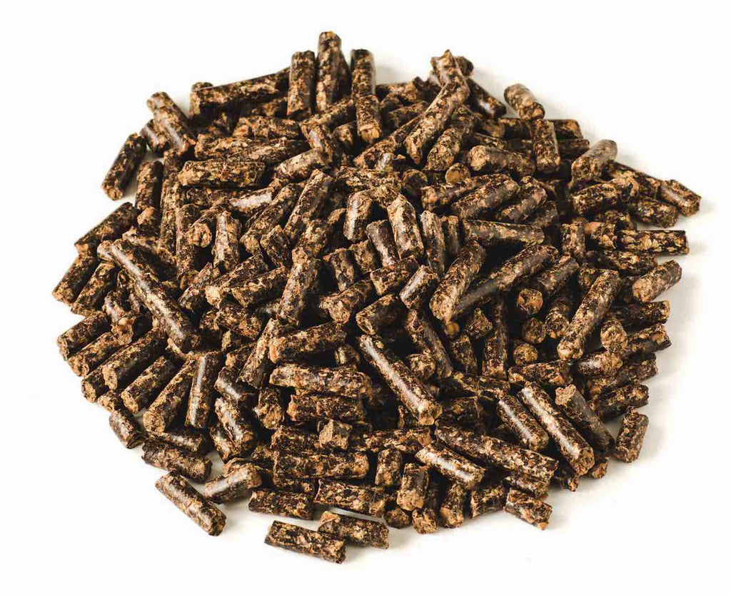 A pile of Naturally Fresh Non-Clumping Walnut Pellet Cat Litter