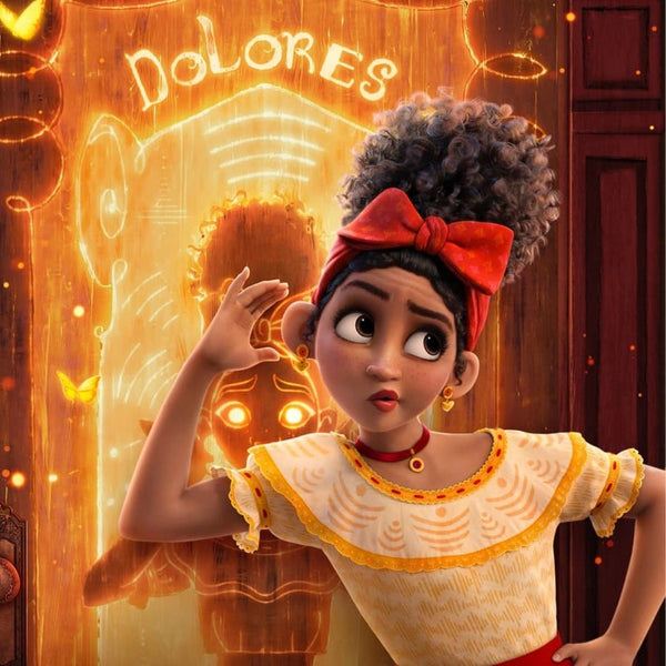 Dolores Madrigal from Disney's Encanto wears her curly hair in a pineapple with a red head band.