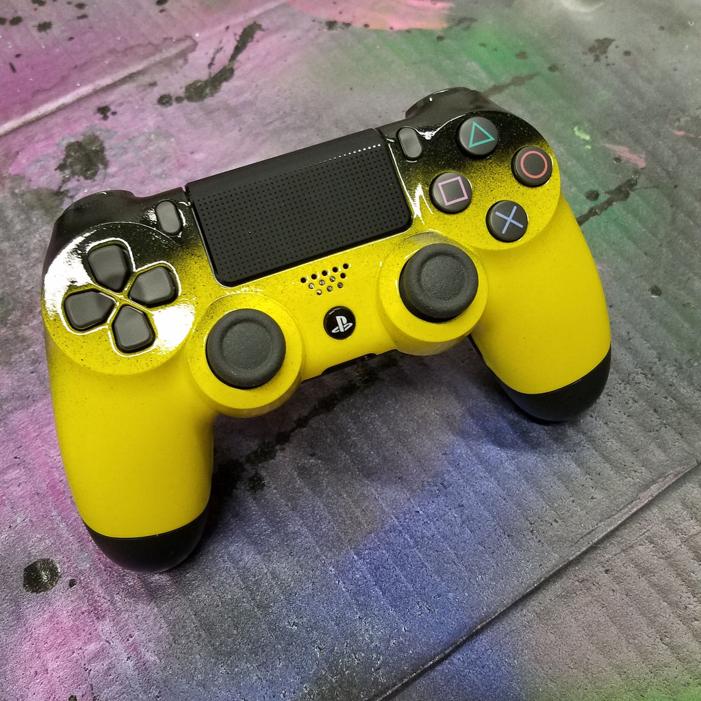 black and yellow ps4 controller