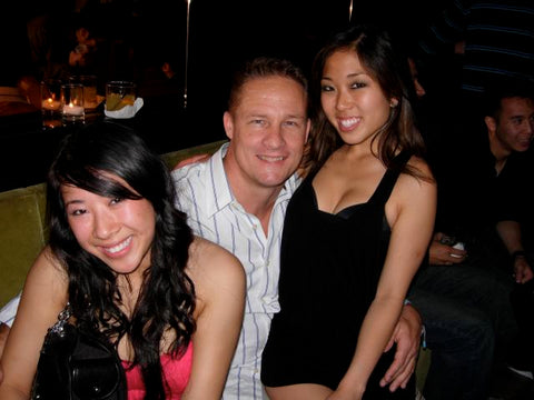 2 Cute Asian girls sitting in Masculine Man's Lap at Club!